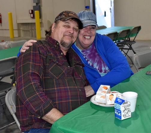 Husband & wife at Member Appreciation Breakfast. 