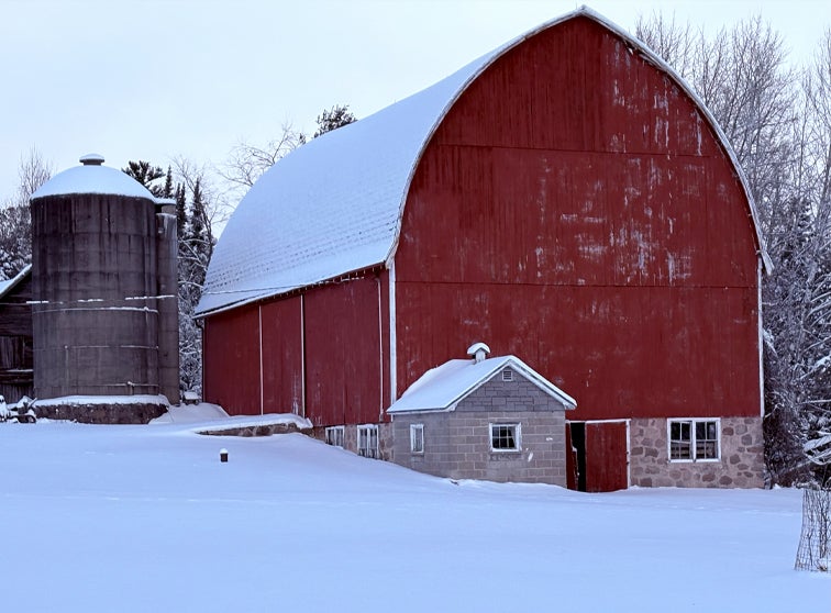 Photo of a barn in the winter.