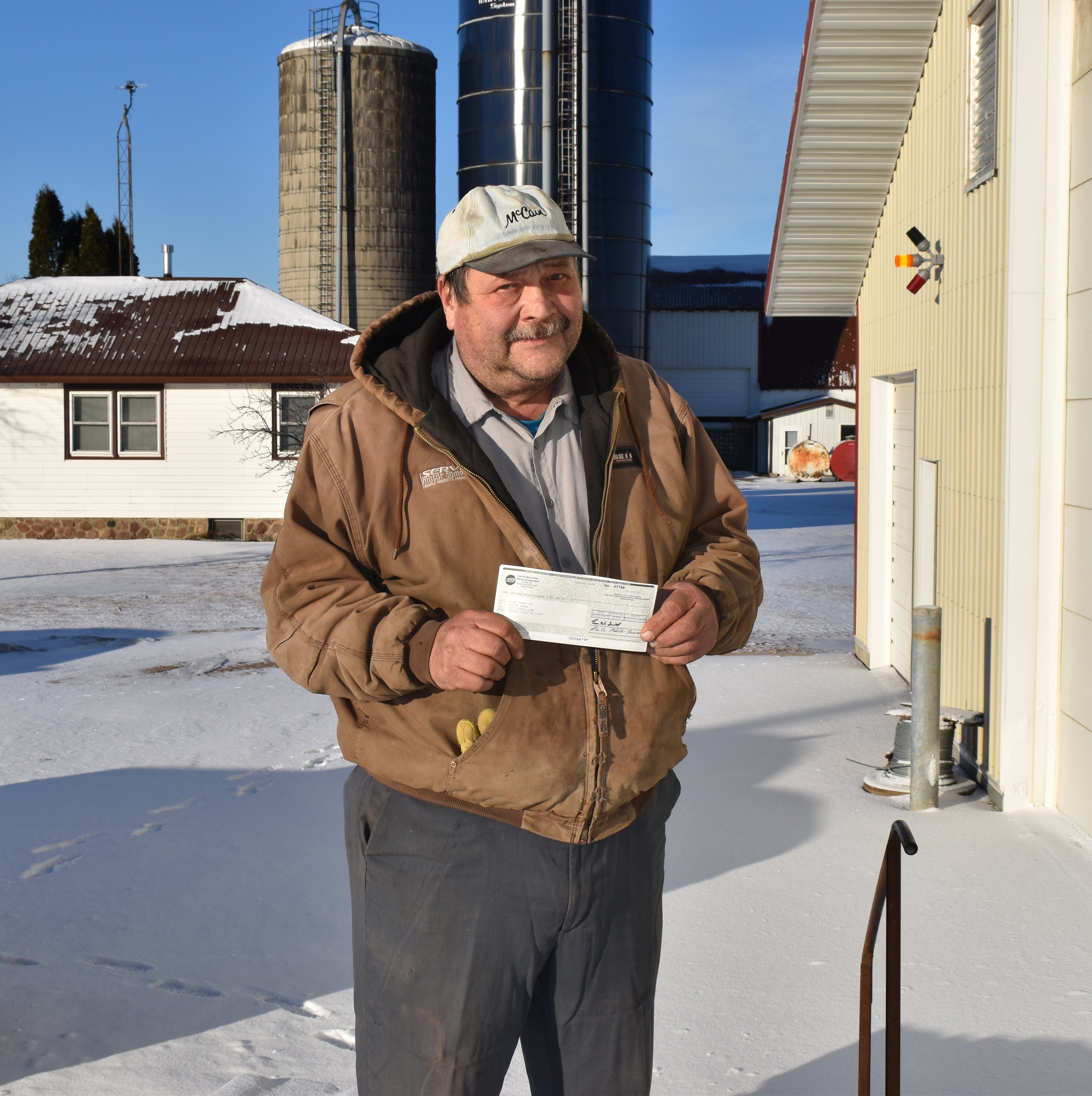 Clifford Gagas with Energy Conservation Rewards check